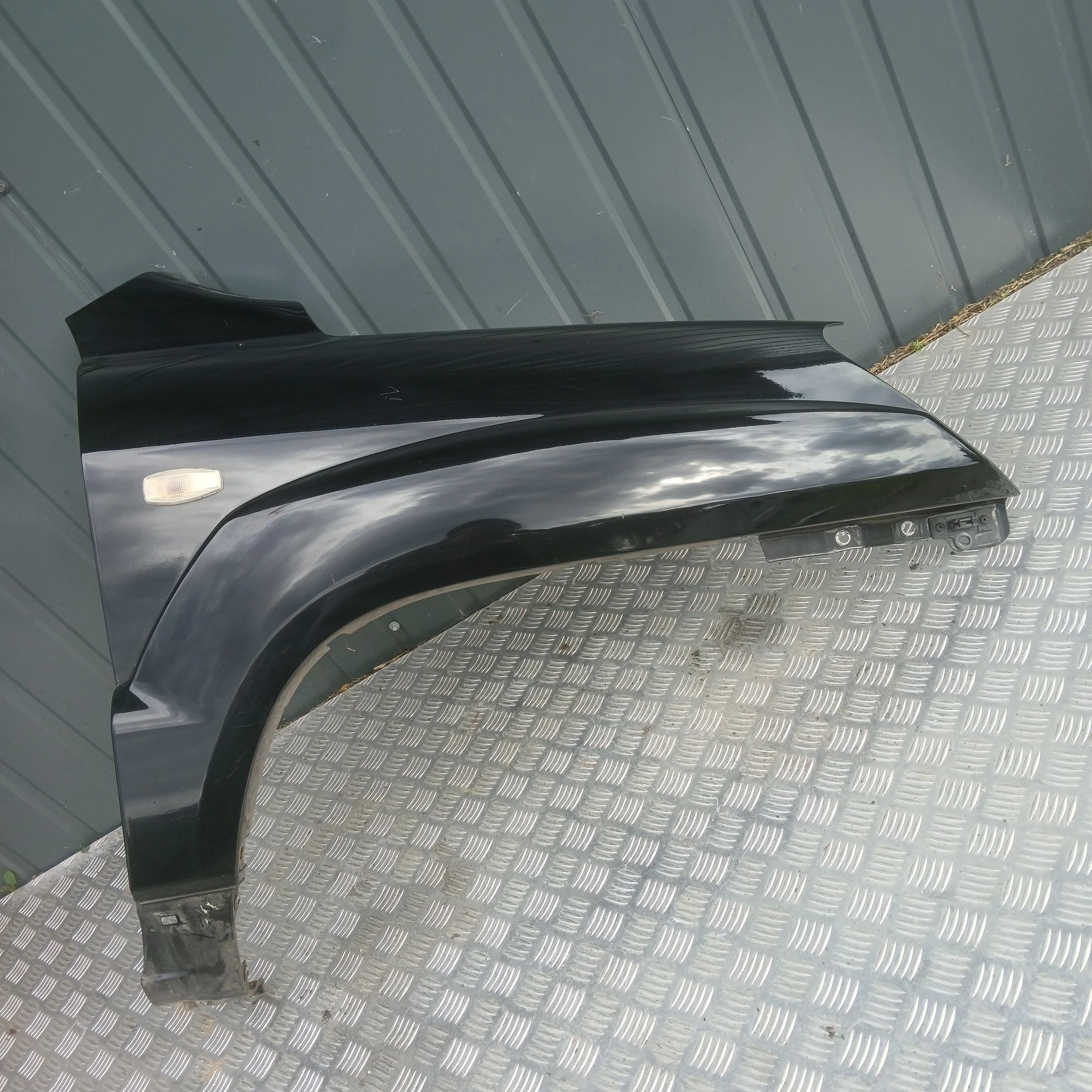 blotnik przod prawy przedni Kia Sportage 2 2004-2010r Kolor 1K
