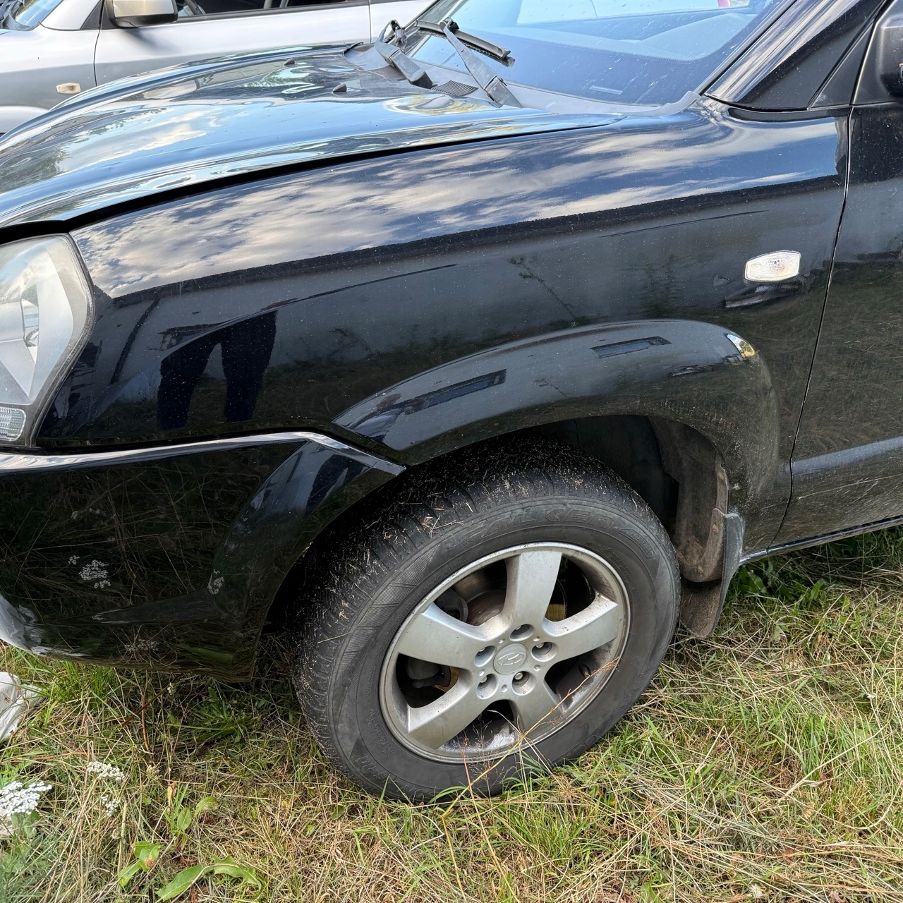 Błotnik Lewy Przód HYUNDAI TUCSON 2004-2010r bez listew poszerzeń EB