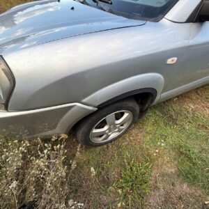 Błotnik Lewy Przód HYUNDAI TUCSON 2004-2010r bez listew poszerzeń YK