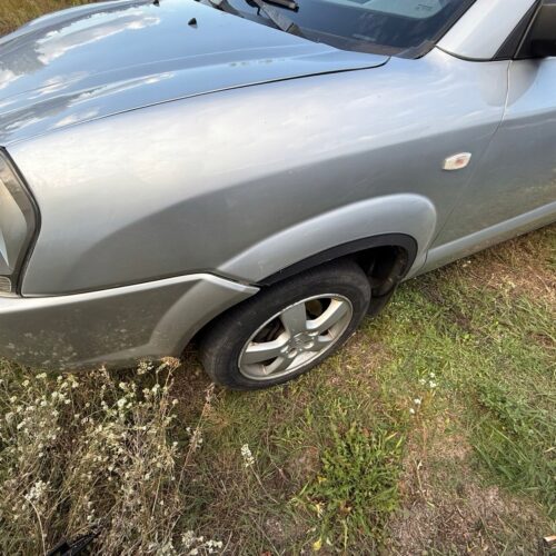 Błotnik Lewy Przód HYUNDAI TUCSON 2004-2010r bez listew poszerzeń YK